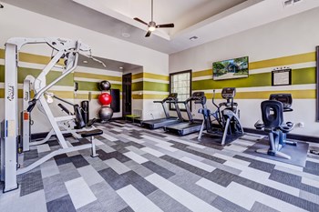 Fitness Center with cardio and weight machines Fitness Center with cardio and weight machines